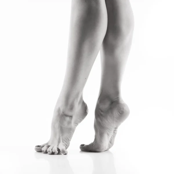 Ballet dancer legs over white — Stock Photo, Image