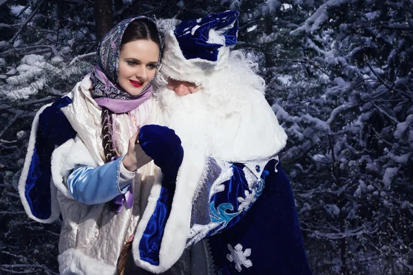 Morozko. Ded Moroz (Father Frost) and girl in the winter forest — Stock Photo, Image