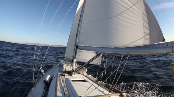 Sailing yacht on the race in blue sea — Stock Video