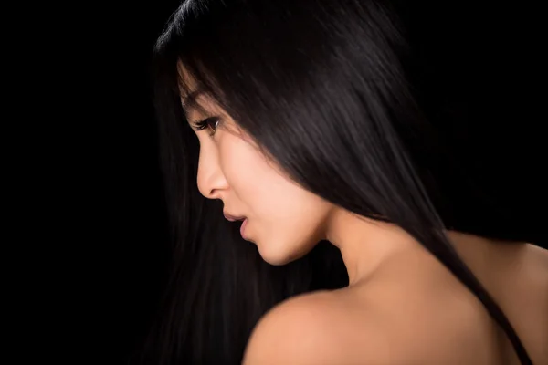 Close-up profile of asian lady in studio — 스톡 사진