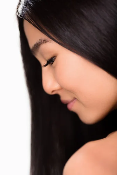 Close-up profile of asian lady in studio — стокове фото