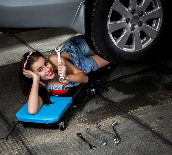 Car mechanic woman