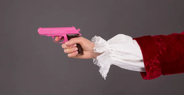 Primer plano de pistola de plástico rosa — Foto de Stock