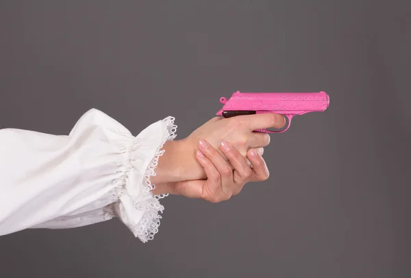 Pistolet różowy zbliżenie — Zdjęcie stockowe