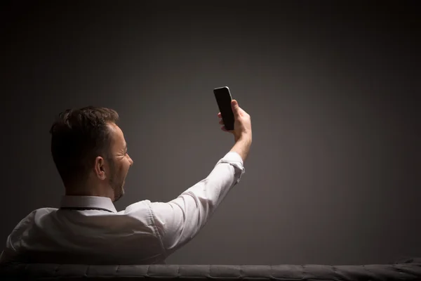 Empresario haciendo selfies — Foto de Stock