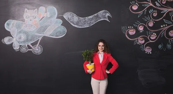 Mujer de negocios con maceta — Foto de Stock