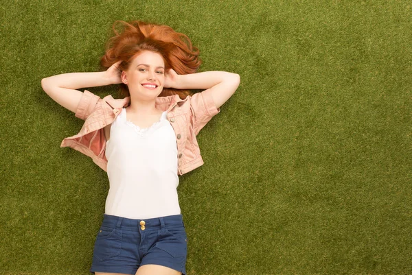 Beautiful woman on grass — Stock Photo, Image