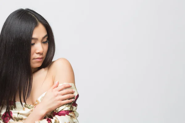 Fashion asian lady in dress in studio — Stock Photo, Image