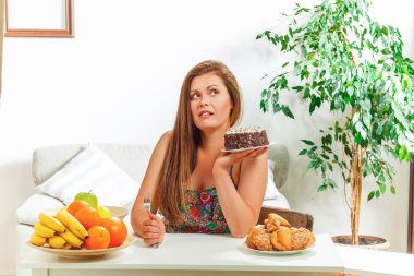 Fat woman sitting at table home clipart