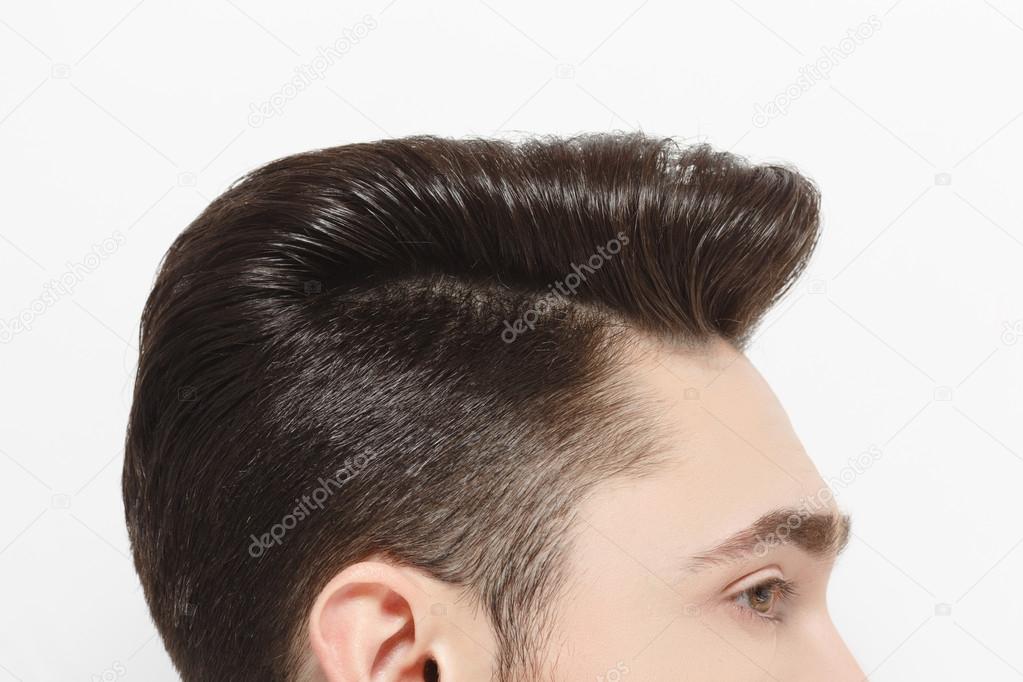 Man with modern hairstyle in studio Stock Photo by ©svyatoslavlipik 114679970 Man with modern hairstyle in studio Stock Photo by ©svyatoslavlipik 114679970