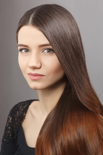 Woman with modern hairstyle in studio — Stock Photo, Image