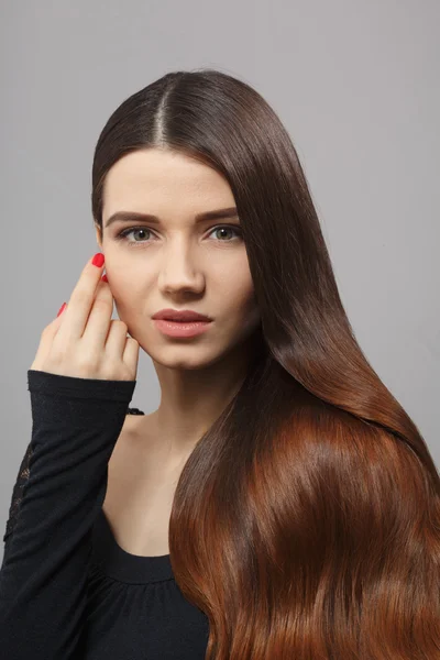 Woman with modern hairstyle in studio — Stock Photo, Image