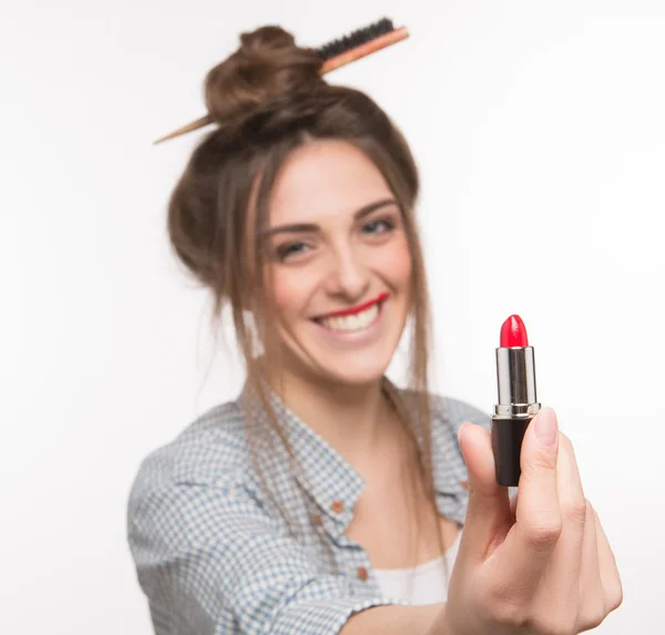 Woman with hairstyle doing makeup — Stok fotoğraf
