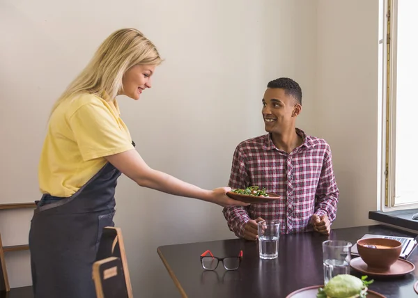 Handsome man in vegan restaurant — Stock Photo, Image