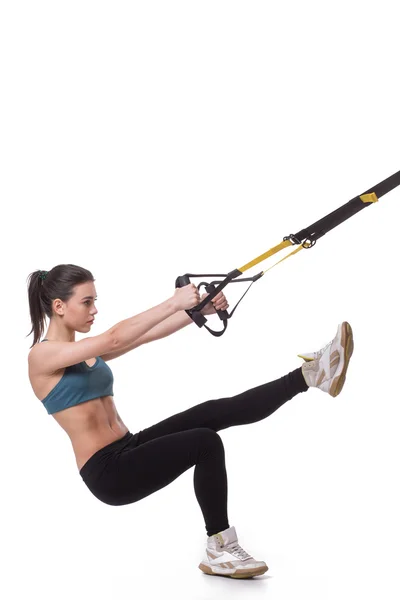 Kvinnlig träning med Suspension Trainer Sling — Stockfoto