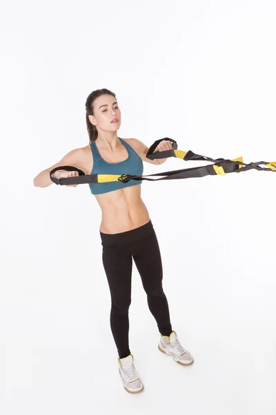 Kvinnlig träning med Suspension Trainer Sling — Stockfoto