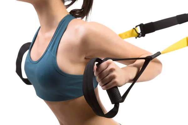 Kvinnlig träning med Suspension Trainer Sling — Stockfoto