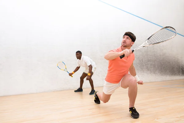 Men playing squash — Stock Photo, Image