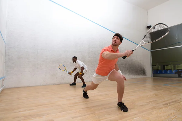 Men playing squash — Stock Photo, Image