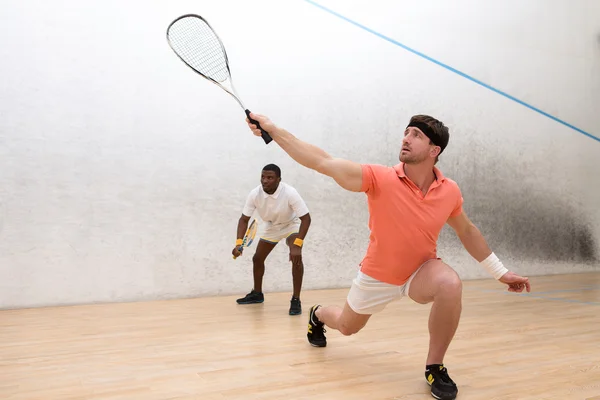 Hombres jugando squash — Foto de Stock