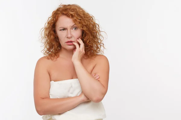 Thoughtful mature woman — Stock Photo, Image