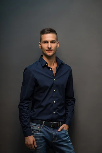 Model man in black shirt posing — Stock Photo, Image