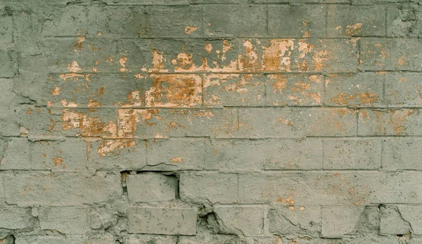 Grunge pareti paterne del vecchio edificio. colore sulla parete esterna dell'edificio. Vecchio edificio con caduta di gesso. Sfondo del modello muro di mattoni — Foto Stock