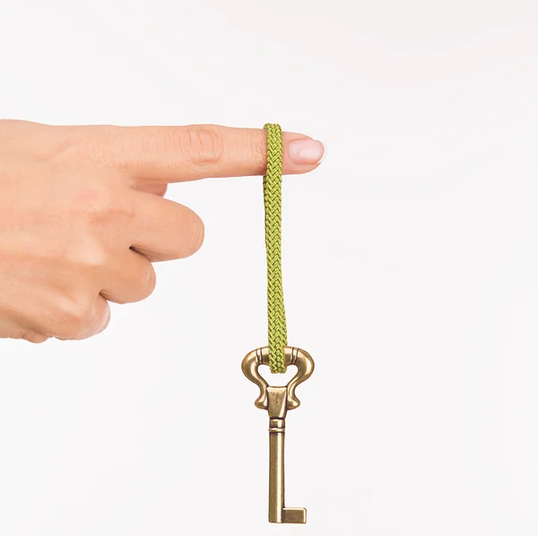 Hand with old key — Stock Photo, Image