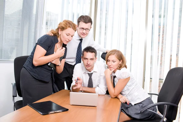 Manager with office workers on meeting — Stock Photo, Image