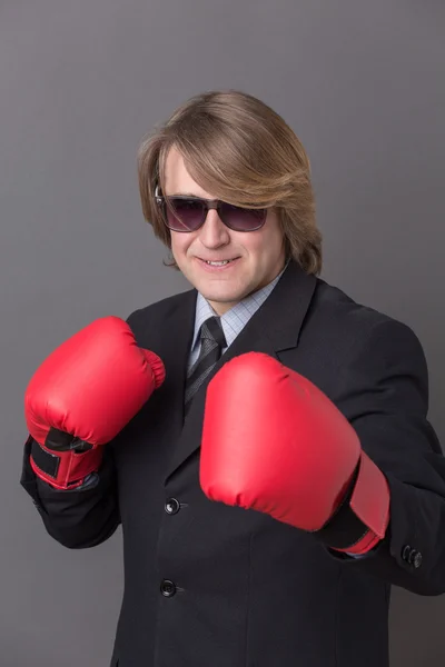 Businessman in boxing gloves — Stock Photo, Image