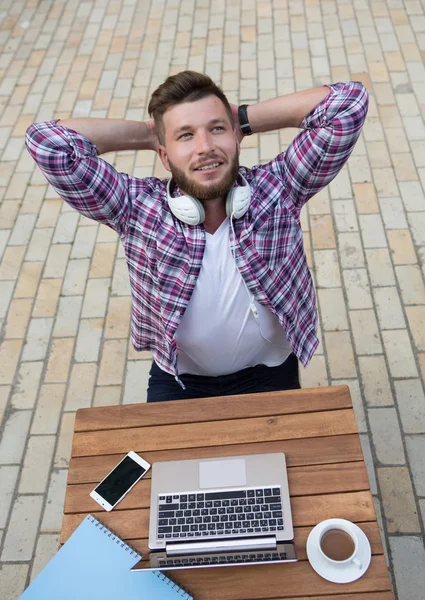 Young hipster in cafe — Stock Photo, Image