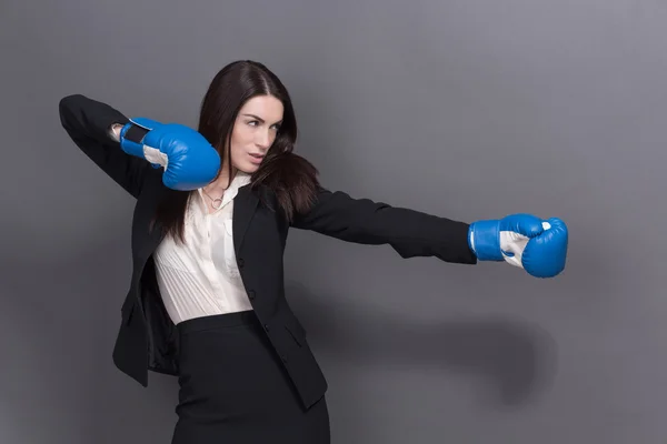 Business lady in boxing gloves — Stock Photo, Image