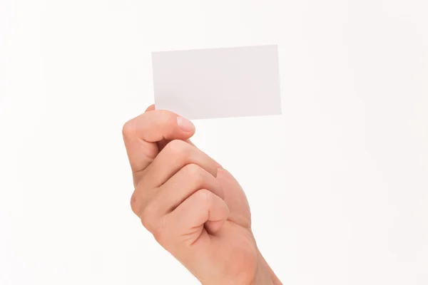 Manos de hombre sosteniendo tarjeta en blanco — Foto de Stock