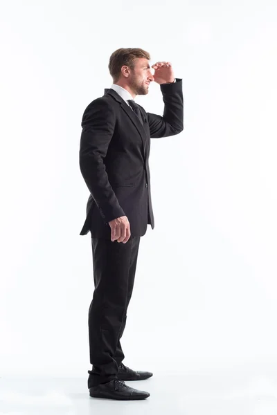 Handsome businessman looking away over white background — Stock Photo, Image