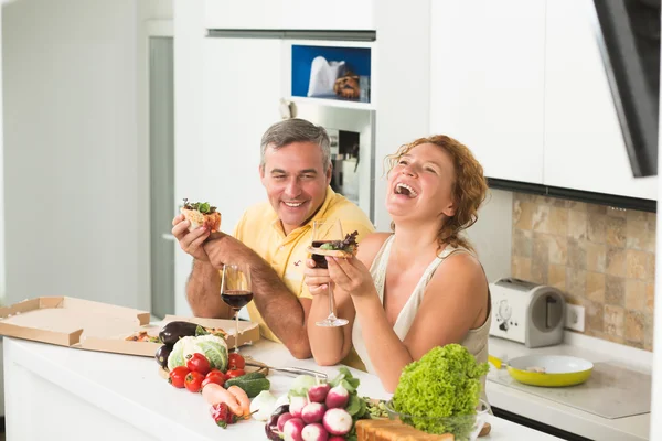 Mature couple in the kitchen — Stock Photo, Image
