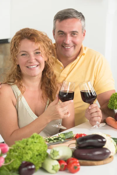 Mature couple in the kitchen Stock Picture