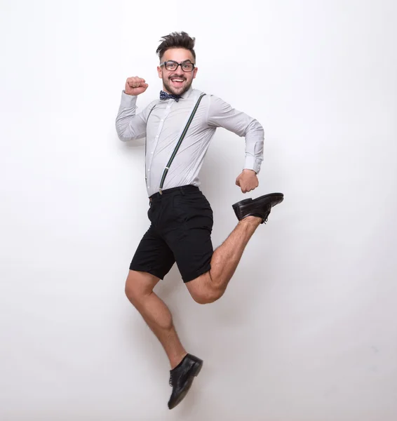 Hipster άνθρωπος πηδά σε φωτογραφία στούντιο — Φωτογραφία Αρχείου