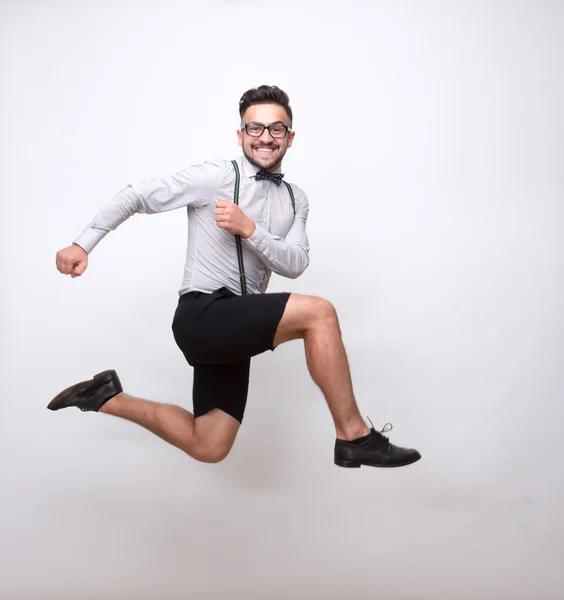 Hipster man hoppa i fotostudio — Stockfoto