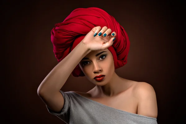 Beautiful latin girl isolated on dark — Stock Fotó