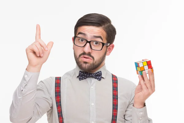 Handsome boy nerd with rubiks cube — Stock Fotó