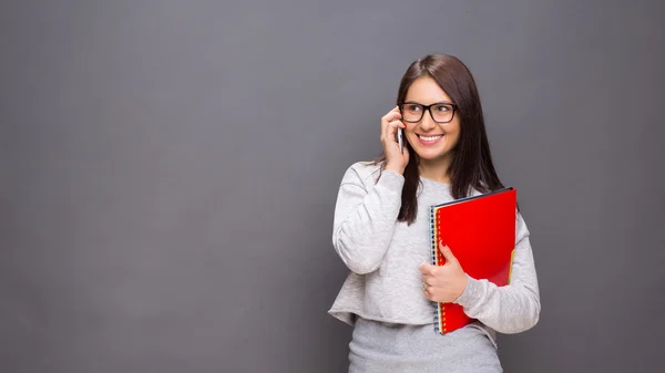 Beautiful brunette with files — Stock Photo, Image