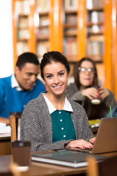 Student lady in classroom — Stock Photo, Image