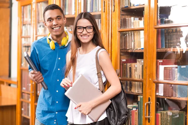 Two Students in library — Stock Photo, Image