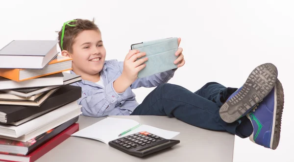 Little boy playing with his tablet PC — Stock Photo, Image