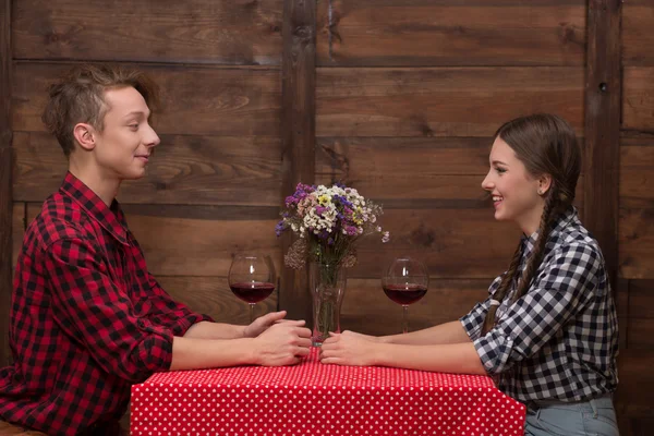 Couple sitting in the restaurant or cafe — Stock Photo, Image