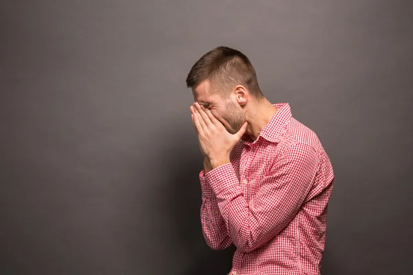 Man covering eyes his face — Stock Photo, Image