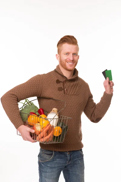 Homem feliz com saco de compras de supermercado — Fotografia de Stock