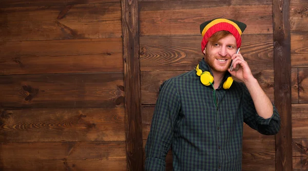 Hipster man speaking over mobile phone — Stock Photo, Image