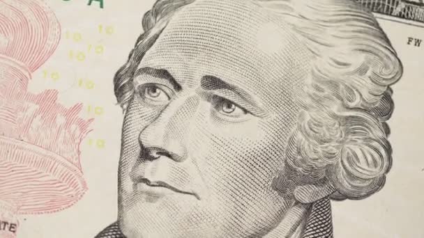 Zbliżenie do twarzy prezydenta Hamiltona na banknotze 10-dolarowym. — Wideo stockowe