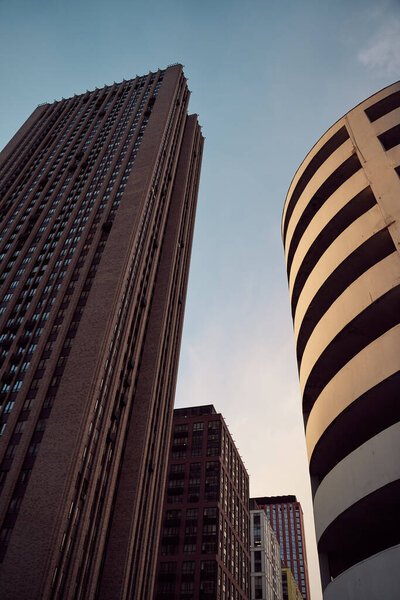 modern skysrapers at dusk. Low angle view
